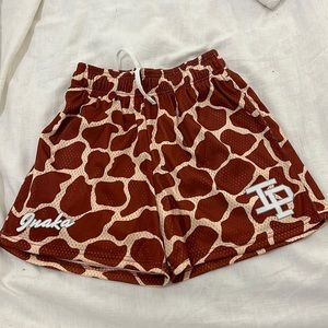 inaka power giraffe gym shorts